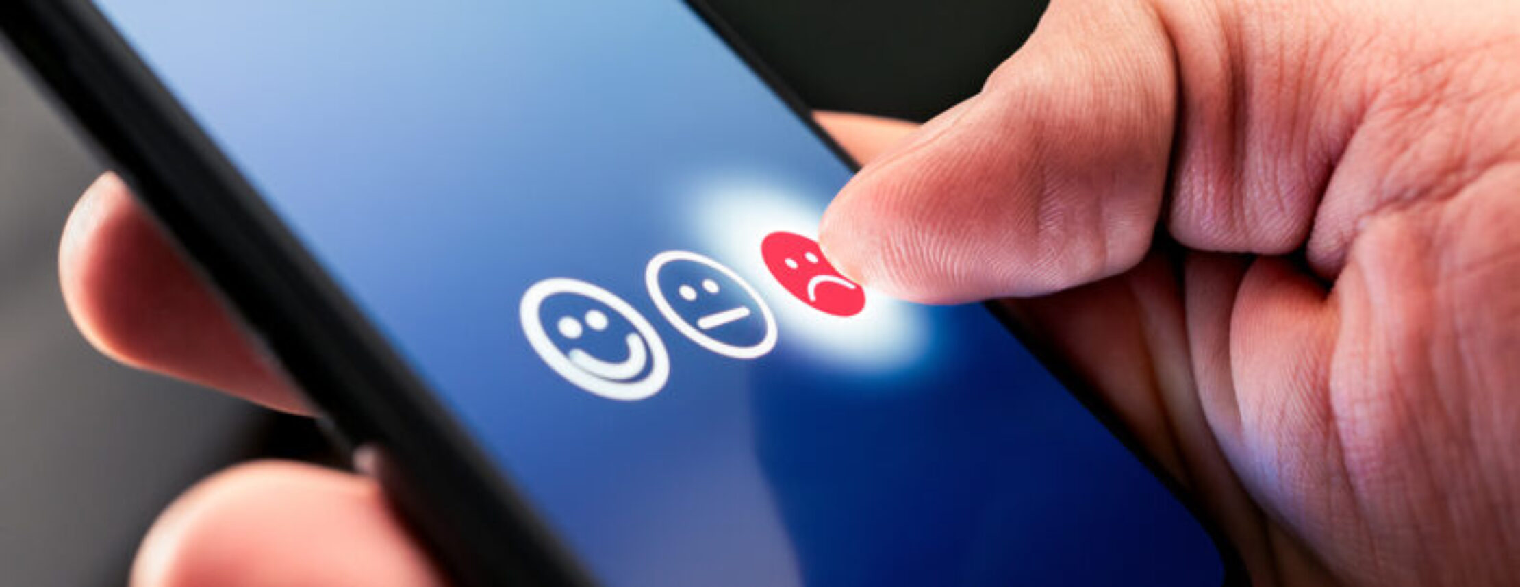 Clicking a negative experience icon on smartphone